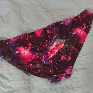 Op vibrant cosmic print bikini bottoms.